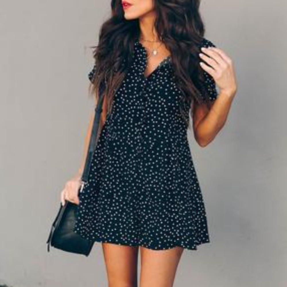 Black polka dot romper. NWT. Perfect condition!
